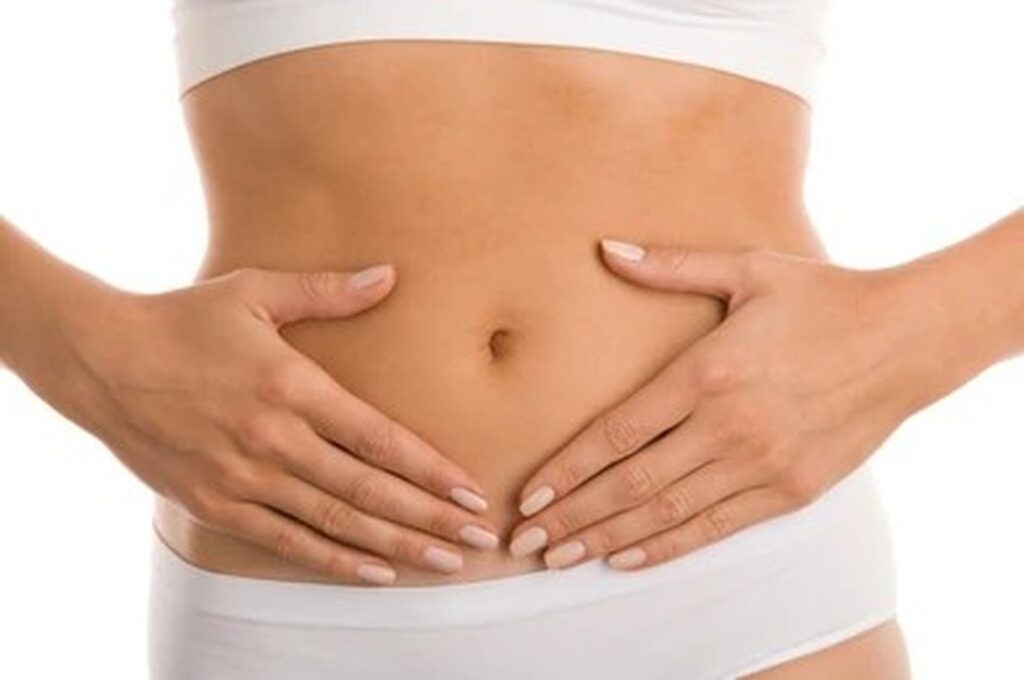 A close-up shot of a woman's stomach after abdominoplasty in Raleigh